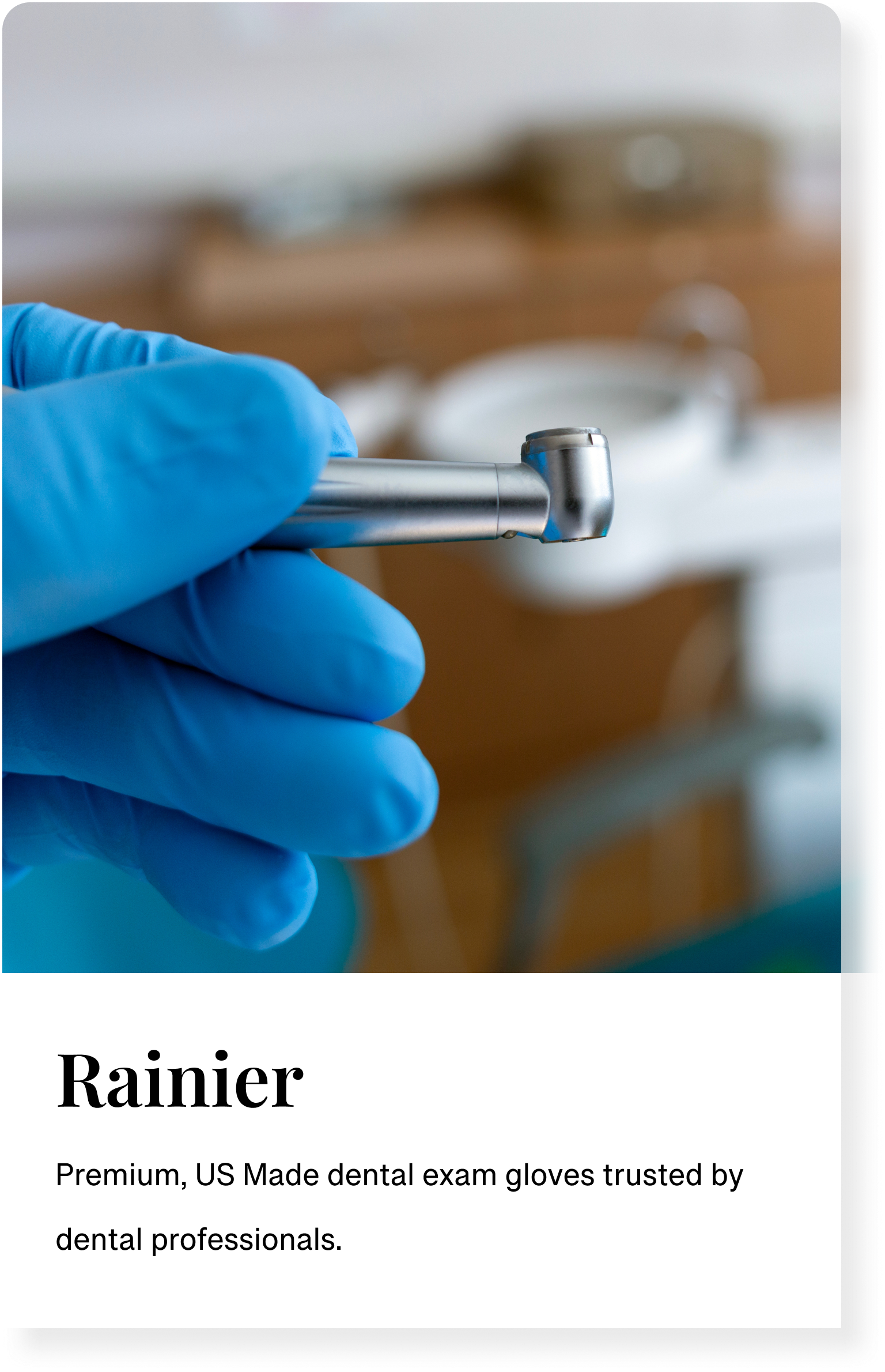 Dentists holding a tool wearing blue nitrile gloves to protect their hands